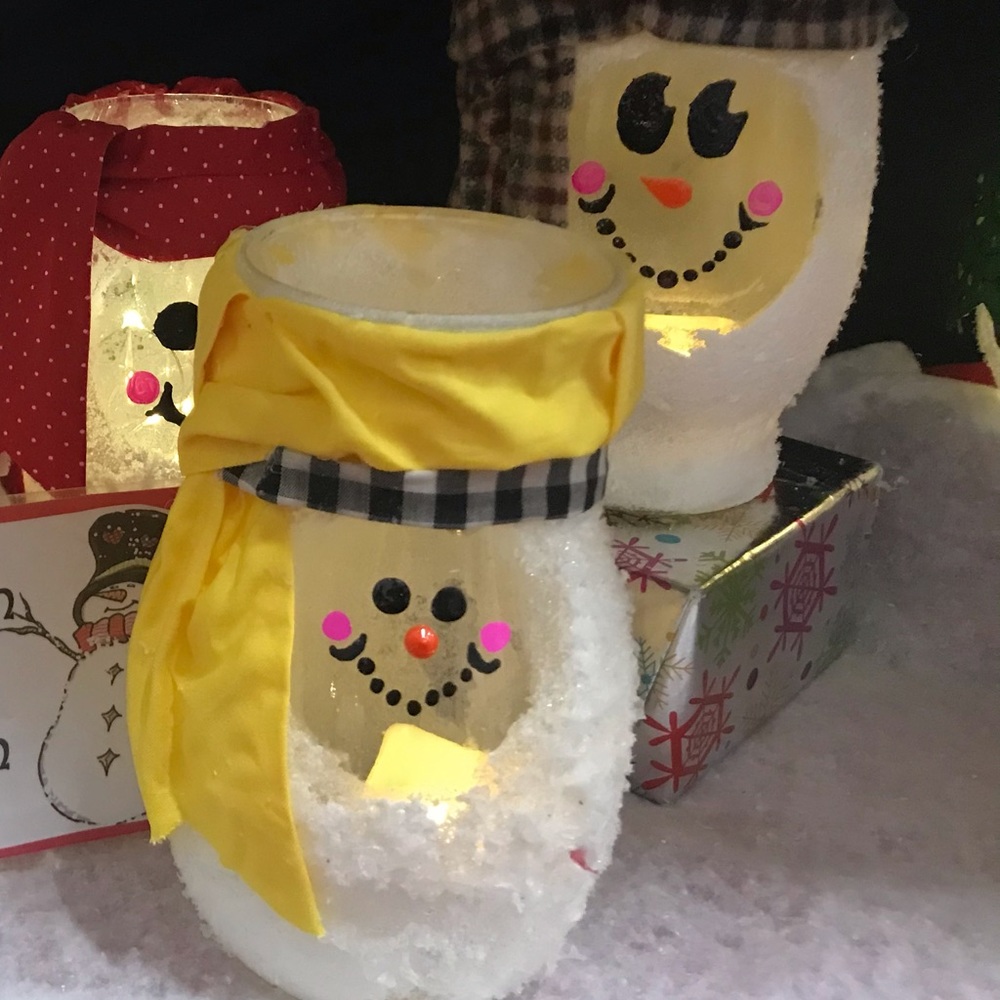 Glass glow snowmen